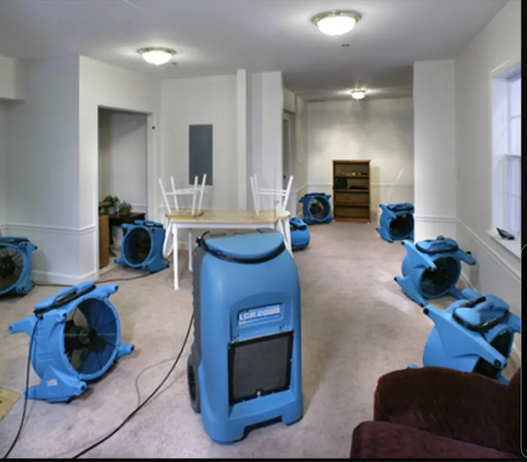 Air movers and dehumidifier setup for Water Damage Restoration in Bellmawr